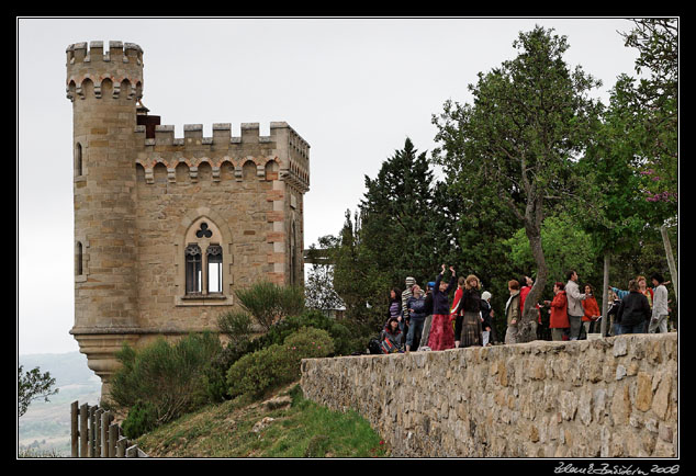 Rennes le Chateau  - Tour Magdal and tourists performing a spiritual excercise