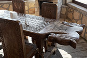 North Cyprus - Agios Thyrsos - wood carvings in the restaurant
